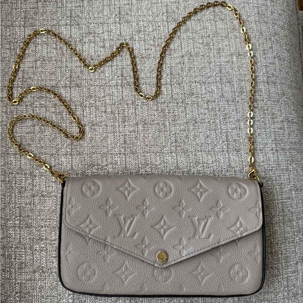 Louis Vuitton Pouchette Félicie Color: turtledove Monogram Empreinte Leather